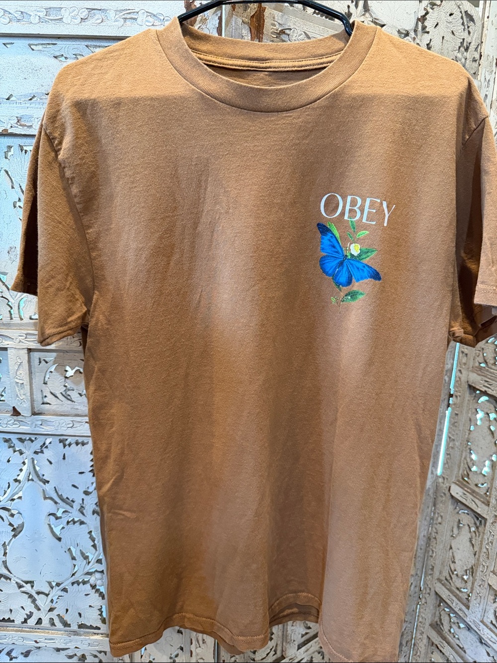 OBEY Brown Short Sleeve Tee with Blue Butterfly Graphic